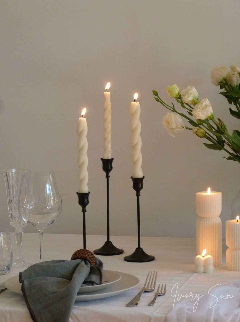 Elegant table setting with candles, flowers, and cutlery on a white tablecloth.
metal candle holders, black candle holders, black candle holders, candle holders australia, candle holder, candle holder australia, ivory sun candle holder, candle accessories, wedding candle holders, dinner party candle holders, decor candle holders, twin candle holders, table decor, taper candles, candle holders set