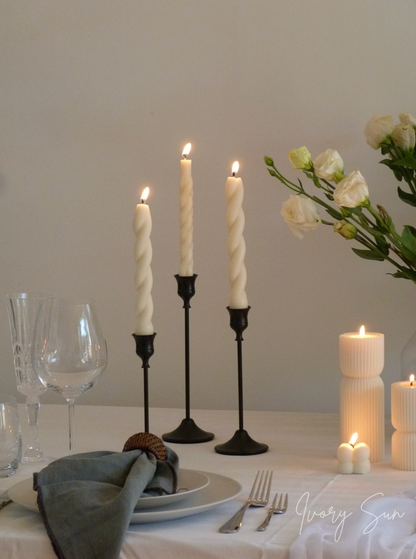 Elegant table setting with candles, flowers, and cutlery on a white tablecloth.
metal candle holders, black candle holders, black candle holders, candle holders australia, candle holder, candle holder australia, ivory sun candle holder, candle accessories, wedding candle holders, dinner party candle holders, decor candle holders, twin candle holders, table decor, taper candles, candle holders set