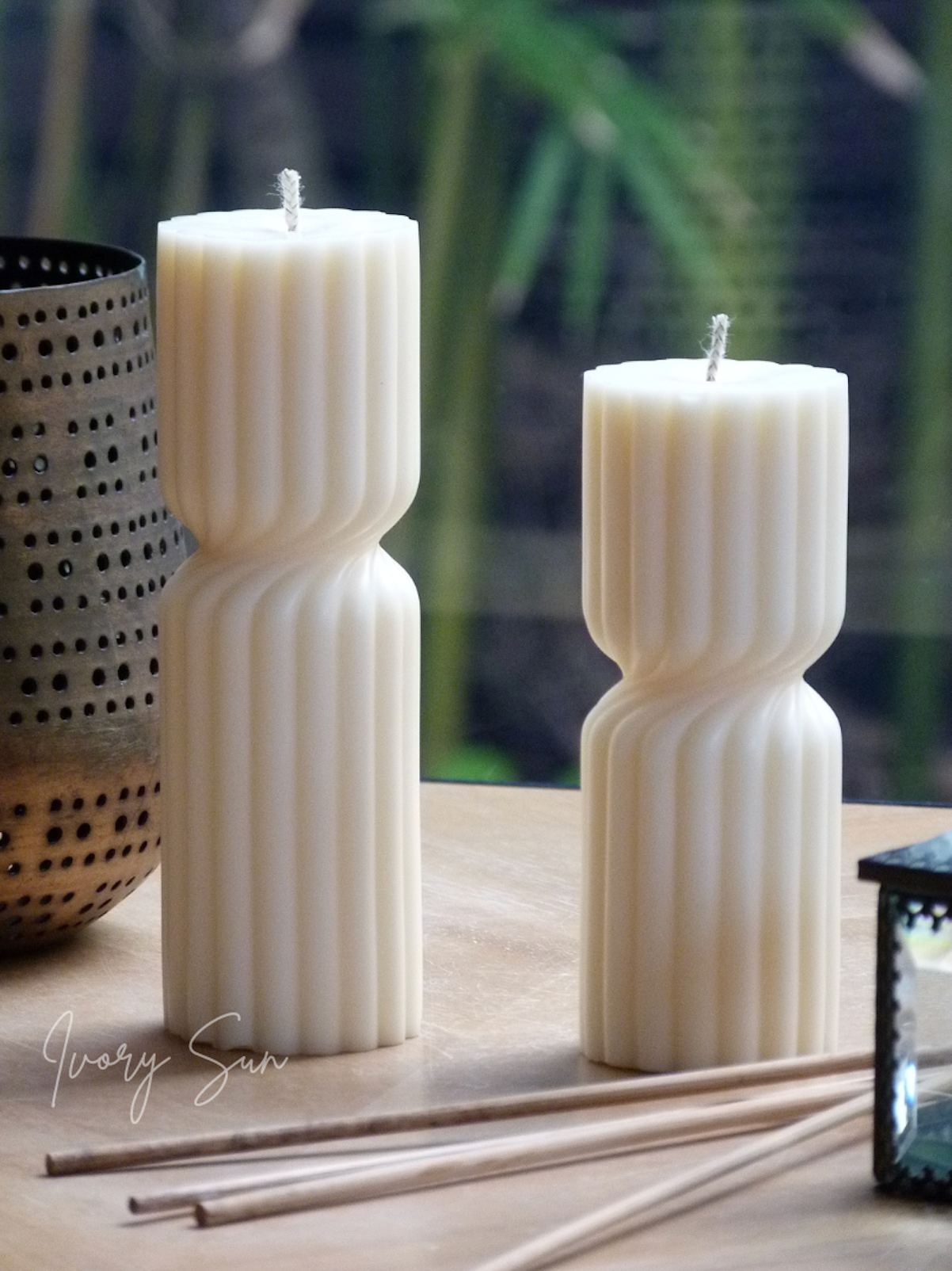 Two white textured candles on a wooden surface with a blurred natural background.  Pillar candle, pillar candles, sculptural candle, soy candle, scented soy candle, essential oils candle, beeswax candle, non toxic candles, decor candles, Sculptural candles Australia
Decorative candles Australia
Beeswax candles Australia
Handcrafted soy candles
Modern candles Australia
Pillar Candles Australia
Gift ideas for home lovers 
Housewarming gifts Australia
Sculptural Candles
Candles, Candles Australia, Nova candle
