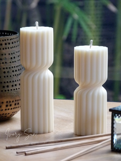 Two white textured candles on a wooden surface with a blurred natural background.  Pillar candle, pillar candles, sculptural candle, soy candle, scented soy candle, essential oils candle, beeswax candle, non toxic candles, decor candles, Sculptural candles Australia
Decorative candles Australia
Beeswax candles Australia
Handcrafted soy candles
Modern candles Australia
Pillar Candles Australia
Gift ideas for home lovers 
Housewarming gifts Australia
Sculptural Candles
Candles, Candles Australia, Nova candle
